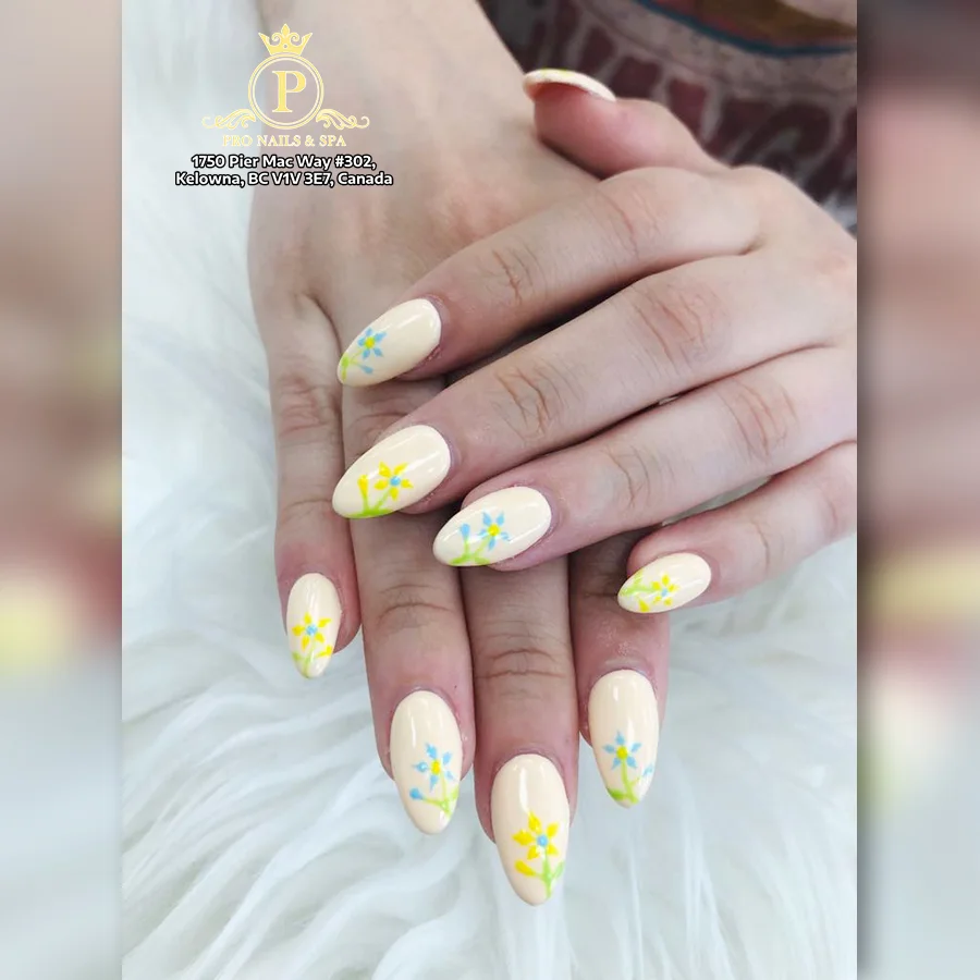 Soft yellow floral manicure